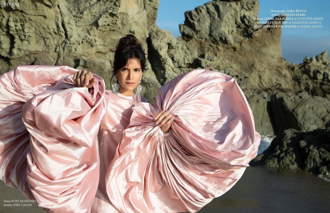 Actress and model Patricia Velásquez in a pink taffeta Puey Quiñones gown with sculptural sleeves for BLOWE Magazine, styled by Quentin Fears